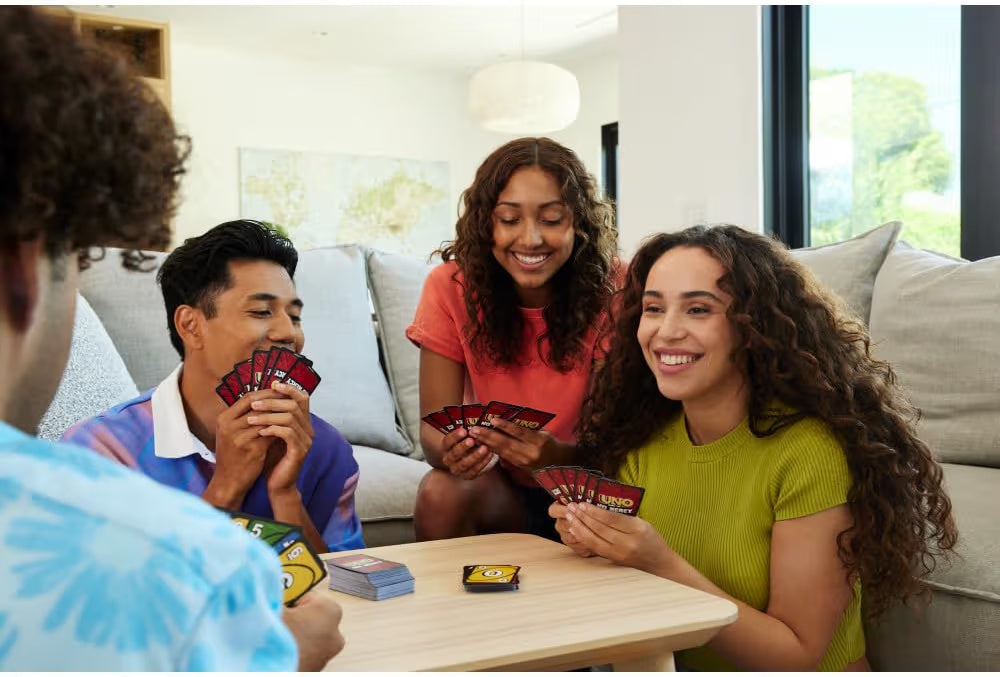 Mattel Games UNO Show 'Em No Mercy card game for kids, adults and family parties and travels with extra cards, special rules and tough penalties.